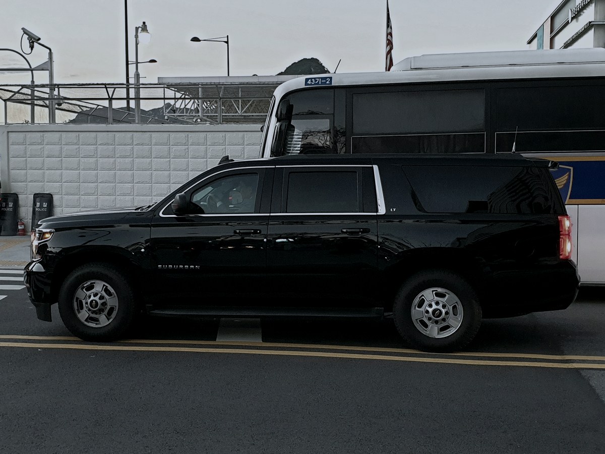 2025 Chevrolet Suburban in black — Executive SUVs chauffeur vehicle seating 6 passengers