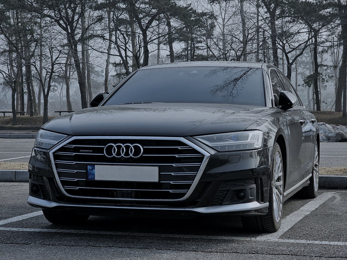 2024 Audi A8 in black — Flagship Sedans chauffeur vehicle seating 3 passengers